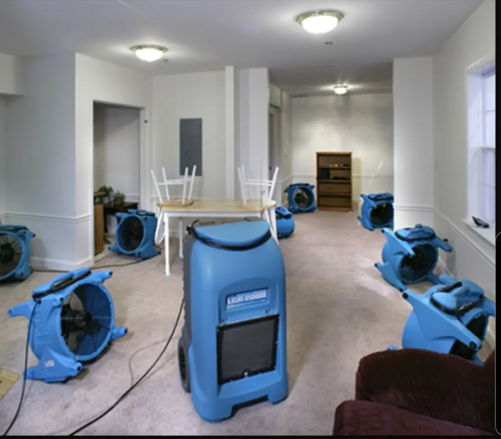 Air movers and dehumidifier setup for Water Damage Restoration in Indianola